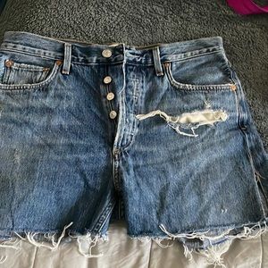 AGOLDE raw edge denim shorts.